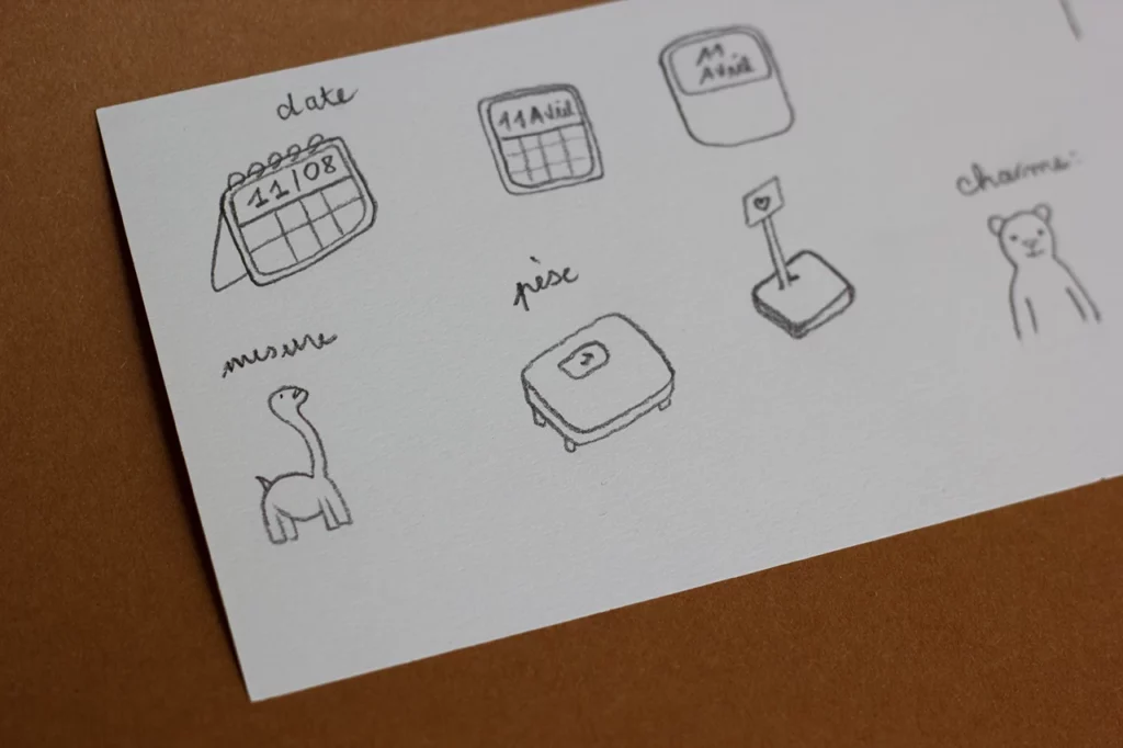 Croquis en cours de réflexion pour illustrer les pages du carnet de naissance du coffret Tendresse.